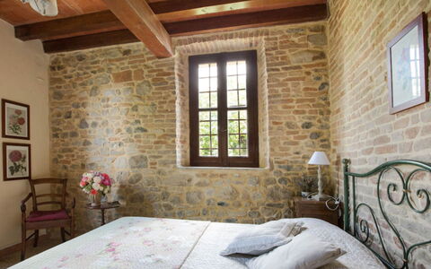 Cascina Arcangelo: Furniture, Wall, Interior Design, Wood, Ceiling, Flooring, Floor, Bedroom, Room, Bed
