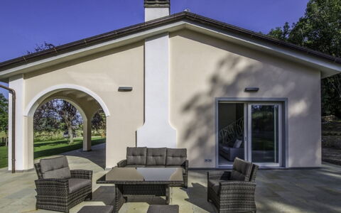 Villa Sara: Home, Estate, Concrete, Shade, Chair, Villa, Outdoor Structure, Porch, Houseplant
