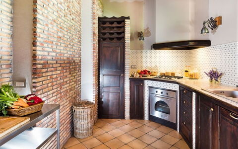 Villa Etna: Interior Design, Flooring, Furniture, Kitchen, Floor, Kitchen Appliance, Countertop, Wood, Ceiling, Major Appliance