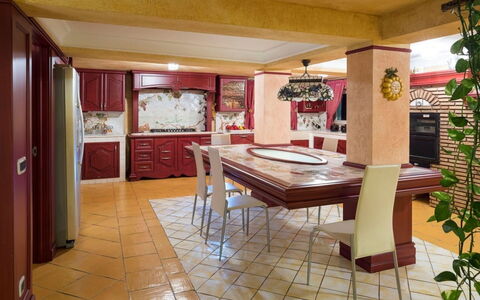 Villa del Drago: Furniture, Interior Design, Flooring, Kitchen, Floor, Wood, Countertop, Ceiling, Kitchen & Dining Room Table, Table
