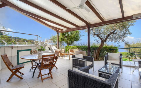 Villa Liliana: Furniture, Chair, Table, Outdoor Furniture, Outdoor Table, Kitchen & Dining Room Table, Porch, Balcony, Shade, Resort