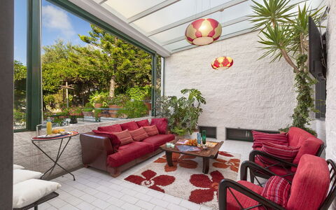 Villa Liliana: Furniture, Interior Design, Flowerpot, Chair, Table, Houseplant, Home, Couch, Coffee Table, Living Room