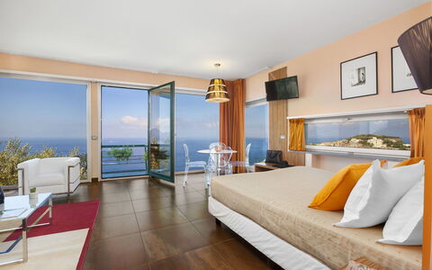 Villa Liliana: Furniture, Interior Design, Flooring, Floor, Table, Bed, Chair, Ceiling, Bedroom, Room