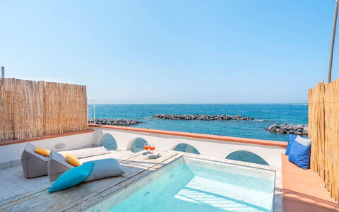 Villa Luce: Blue, Sea, Ocean, Resort, Shade, Coast, Beach, Outdoor Furniture, Hotel, Swimming Pool