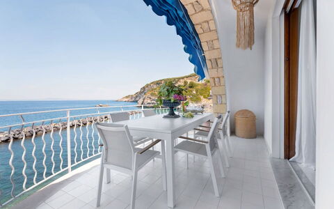 Villa Luce: Sea, Furniture, Ocean, Chair, Outdoor Furniture, Coast, Resort, Balcony, Kitchen & Dining Room Table, Restaurant