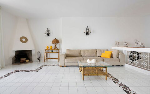 Villa Luce: Flooring, Furniture, Floor, Interior Design, Wall, Living Room, Lighting, Couch, Room, Home