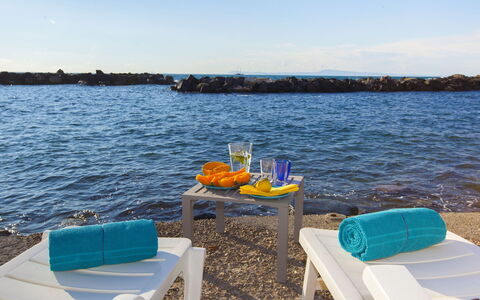 Villa Luce: Blue, Furniture, Sea, Outdoor Furniture, Coastal And Oceanic Landforms, Ocean, Coast, Beach, Chair, Shore