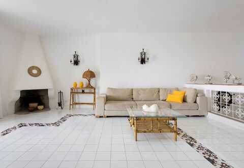 Villa Luce: Flooring, Furniture, Floor, Interior Design, Wall, Living Room, Lighting, Couch, Room, Home