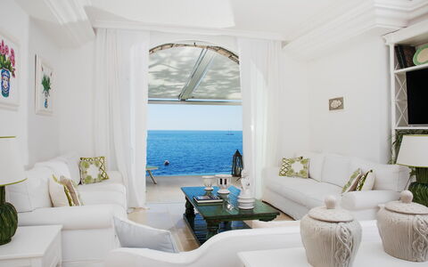 Villa Ribes: Furniture, Sea, Apartment, Couch, Resort, Coast, Ocean, Throw Pillow, Chair
