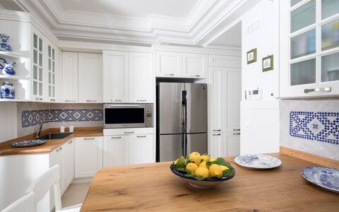 Villa Ribes: Kitchen, Cabinetry, Countertop, Interior Design, Furniture, Wood, Flooring, Major Appliance, Kitchen Appliance, Floor