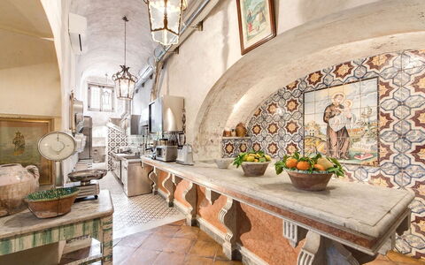 Villa Positano: Interior Design, Ceiling, Tile, Porcelain, Serveware, Chair, Dishware, Kitchen, Kitchen & Dining Room Table, Countertop