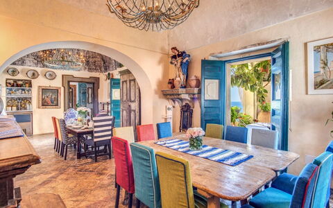 Villa Positano: Furniture, Wall, Interior Design, Table, Chair, Lighting, Architecture, Flooring, Dining Room, Home