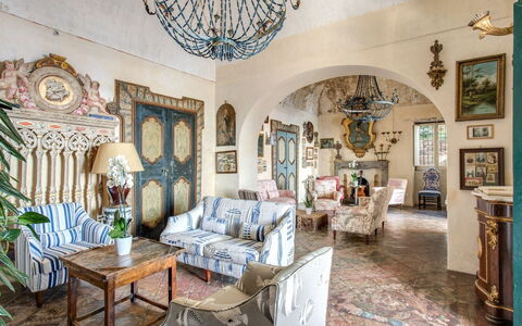 Villa Positano: Furniture, Wall, Interior Design, Flooring, Chair, Living Room, Room, Picture Frame, Ceiling, Houseplant