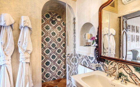Villa Positano: Interior Design, Flooring, Floor, Door, Tile, Plumbing Fixture, Bathroom, Molding, Design, Wood Stain