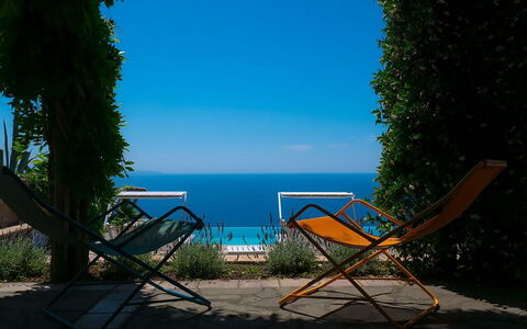 Villa Sant'Agata: Blue, Furniture, Summer, Sea, Outdoor Furniture, Chair, Ocean, Coastal And Oceanic Landforms, Sunlight, Shade