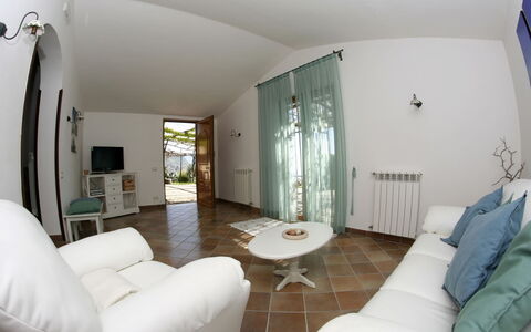 Villa Sant'Agata: Furniture, Flooring, Floor, Interior Design, Ceiling, Lighting, Chair, Room, Living Room, Couch
