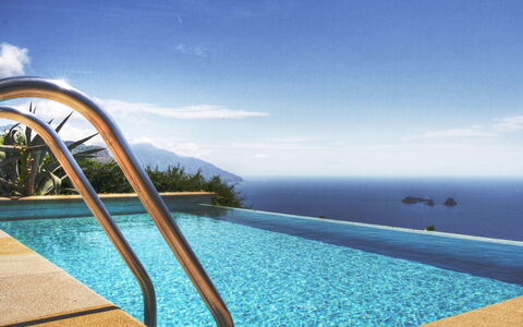 Villa Sant'Agata: Blue, Water, Body Of Water, Swimming Pool, Sea, Resort, Coastal And Oceanic Landforms, Leisure, Ocean, Outdoor Furniture