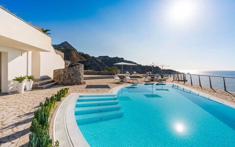 Villa Taormina- Baya Bella: Blue, Water, Body Of Water, Sea, Coastal And Oceanic Landforms, Coast, Swimming Pool, Ocean, Resort, Beach