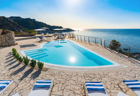Villa Taormina- Baya Bella: Blue, Water, Body Of Water, Swimming Pool, Coastal And Oceanic Landforms, Sea, Coast, Resort, Beach, Outdoor Furniture