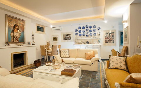 Villa Teresa: Furniture, Interior Design, Couch, Flooring, Ceiling, Wood, Table, Living Room, Floor, Room