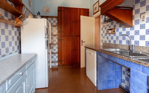 Villa Magazzini: Flooring, Kitchen, Wood, Interior Design, Floor, Countertop, Major Appliance, Cabinetry, Kitchen Appliance, Room