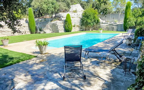 Mas du Castelet: Swimming Pool, Blue, Outdoor Furniture, Shade, Garden, Flagstone, Resort, Leisure, Landscaping, Backyard