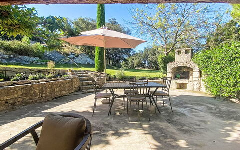 Mas du Castelet: Furniture, Outdoor Furniture, Chair, Garden, Flagstone, Table, Outdoor Table, Shade, Backyard