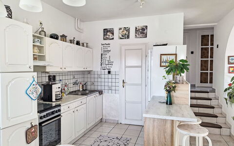 Bonika: Furniture, Flooring, Interior Design, Floor, Wood, Kitchen, Cabinetry, Major Appliance, Room, Ceiling