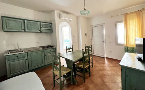 Apartments In Golfo Orosei: Furniture, Interior Design, Flooring, Floor, Countertop, Ceiling, Kitchen, Room, Table, Lighting