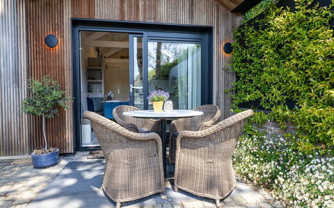 Residence Domburgse Duinen: Cottage, Home, Garden, Garden Buildings, Yard, Chair, Siding, Backyard, Shade, Outdoor Furniture