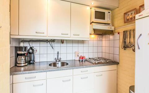 Buitenplaats Schouwen Nr 86: Countertop, Kitchen, Sink, Kitchen Appliance, Interior Design, Plumbing Fixture, Major Appliance, Flooring, Tap, Floor