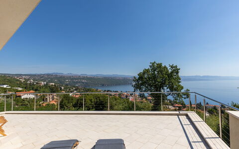 Anna: Shrub, Residential Area, Porch, Garden, Balcony, Shade, Outdoor Furniture, Yard, Chair, Landscaping