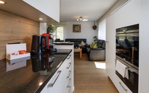 Chalet an der Egg: Furniture, Interior Design, Countertop, Kitchen, Flooring, Cabinetry, Wall, Kitchen Appliance, Floor, Wood