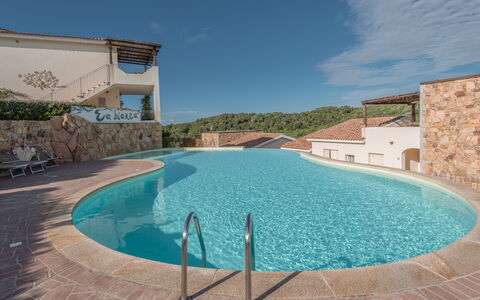 Baia Bianca Apartments Sardinia: Blue, Water, Swimming Pool, Resort, Eco Hotel, Hotel, Resort Town, Thermae, Villa, Hacienda
