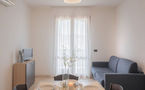 Le Fontane Apartments In Villasimius: Interior Design, Furniture, Flooring, Floor, Wood, Room, Ceiling, Lighting, Apartment, Living Room