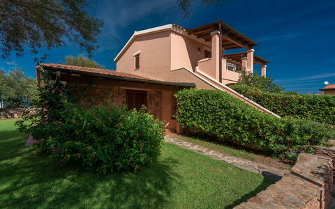 San Teodoro Apartments: Architecture, Shrub, Home, House, Roof, Garden, Estate, Farmhouse, Landscaping, Hacienda
