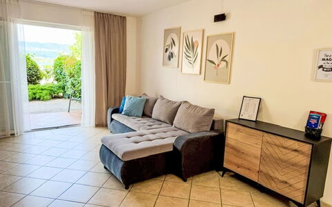 Mirta: Furniture, Interior Design, Flooring, Floor, Wood, Couch, Room, Lighting, Living Room, Home
