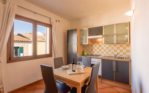 Cristal Blu Apartments In Santa Teresa Gallura: Furniture, Home, Door, Wood Stain, Chair, Apartment, Hardwood, Kitchen & Dining Room Table, Major Appliance, Kitchen
