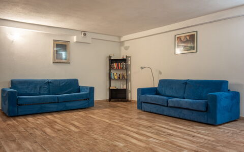 Cristal Blu Apartments In Santa Teresa Gallura: Furniture, Couch, Flooring, Floor, Interior Design, Wood, Living Room, Wood Flooring, Room, Apartment