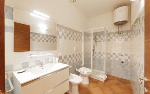 Cristal Blu Apartments In Santa Teresa Gallura: Flooring, Floor, Interior Design, Plumbing Fixture, Bathroom, Ceiling, Plumbing, Tile, Toilet
