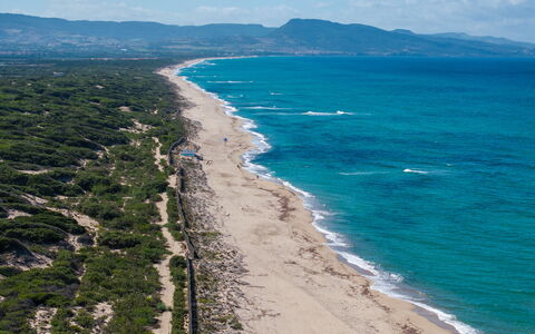 Apartment Sardinia Seaside Ac And Wifi: Water, Body Of Water, Coast, Beach, Sea, Horizon, Coastal And Oceanic Landforms, Shore, Waterway, Ocean