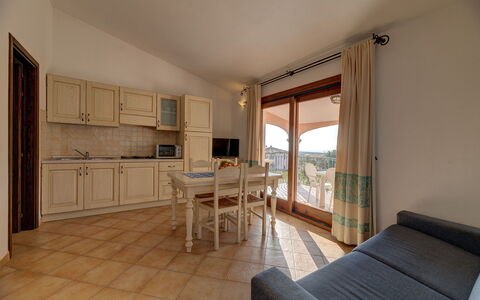 Apartment Sardinia Seaside Ac And Wifi: Furniture, Flooring, Interior Design, Floor, Ceiling, Room, Kitchen, Apartment, Kitchen & Dining Room Table, Wood Stain