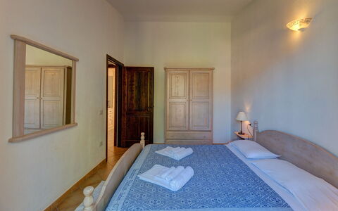 Apartment Sardinia Seaside Ac And Wifi: Furniture, Flooring, Floor, Interior Design, Bed, Bedroom, Ceiling, Bed Frame, Bed Sheet, Room