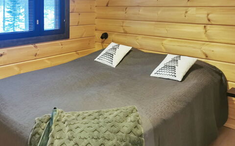 Villa Korpi: Wood, Bedroom, Home, Bed Frame, Bed, Log Cabin, Bedding, Bed Sheet, Wood Stain, Room
