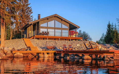 Lakeside Villa: Bed, Furniture, Bedroom, Interior Design, Bedding, Bed Sheet, Flooring, Wood, Floor, Room
