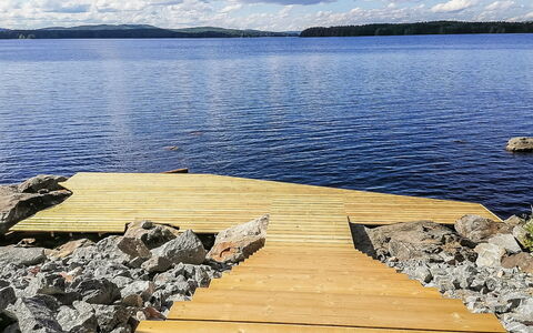 Lakeside Villa: Bed, Furniture, Bedroom, Interior Design, Bedding, Bed Sheet, Flooring, Wood, Floor, Room