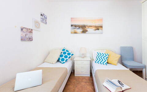 Appartamento Lido Specchiolla: Furniture, Interior Design, Floor, Flooring, Room, Apartment, Pillow, Throw Pillow, Bedroom, Bed