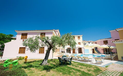 Violet Residence In Orosei: Swimming Pool, Residential Area, Town, Resort, Estate, Human Settlement, Outdoor Furniture, Home, Apartment, Hacienda