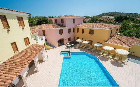 Violet Residence In Orosei: Swimming Pool, Resort, Human Settlement, Outdoor Furniture, Hotel, Estate, Villa, Hacienda, Resort Town, Thermae