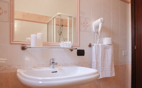 Violet Residence In Orosei: Wall, Interior Design, Bathroom Sink, Plumbing Fixture, Flooring, Bathroom, Furniture, Floor, Mirror, Sink
